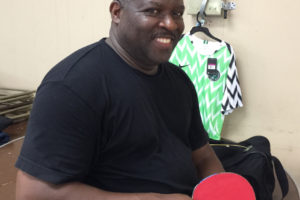 Coach Ray at Nigerian American Table Tennis Development Center Balling.